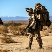 Warfighter Walking with Heavy Backpack and Gear